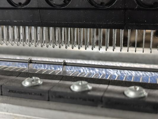 経編機におけるガイドバーの役割を理解する